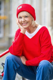 Ribbed beanie with logo patch in tomato