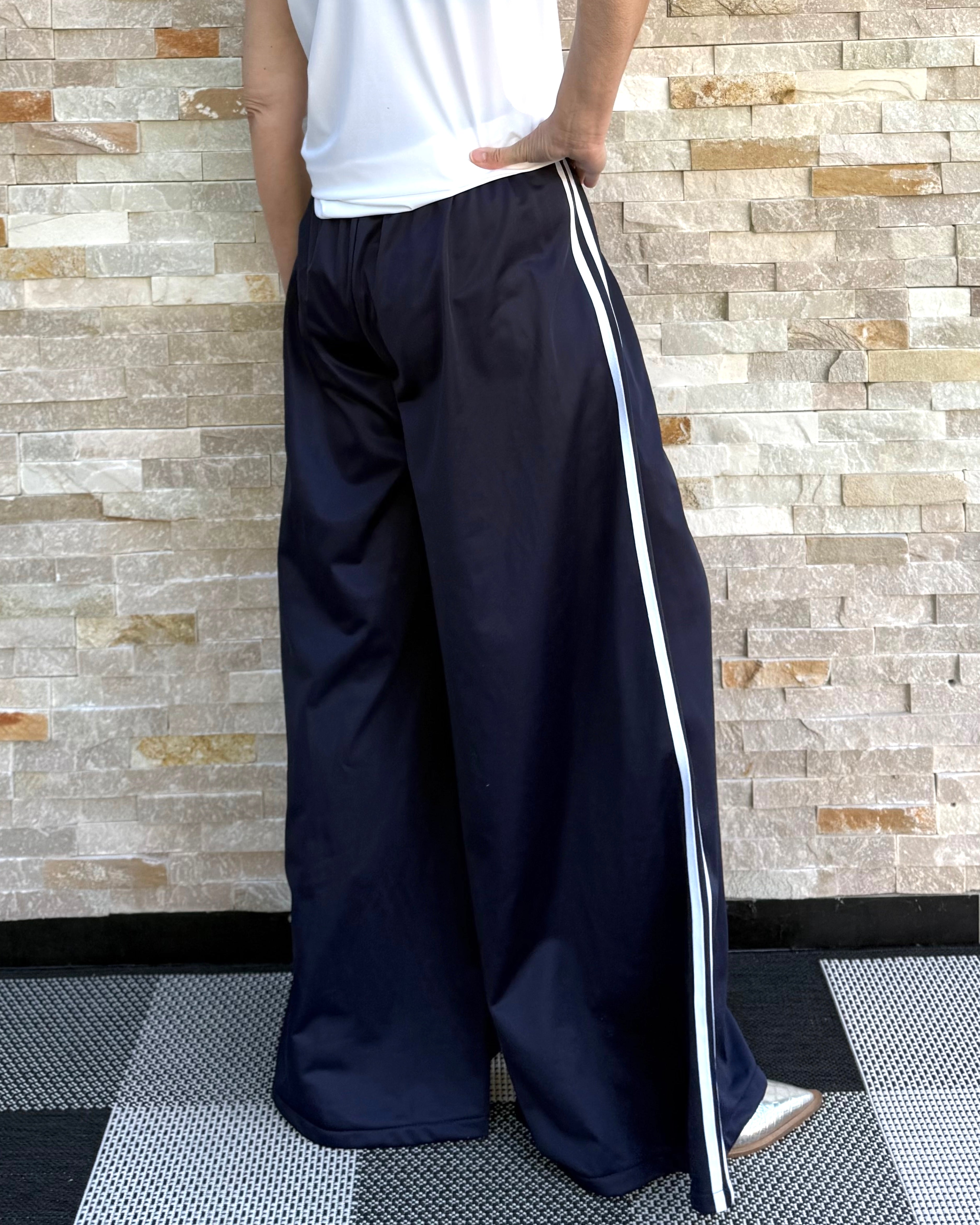 Track pants with galloon stripes in navy blue