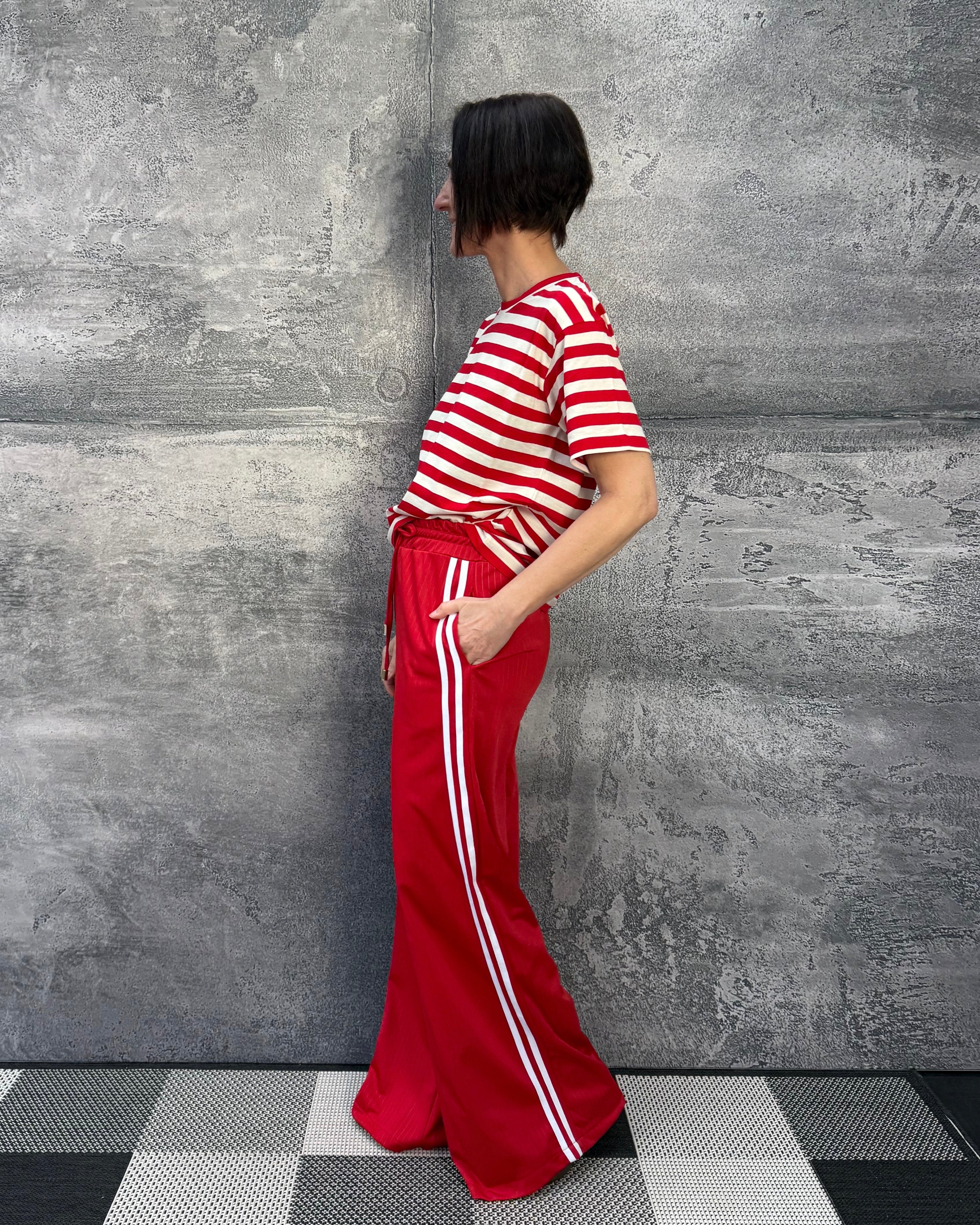 Track pants with galloon stripes in red