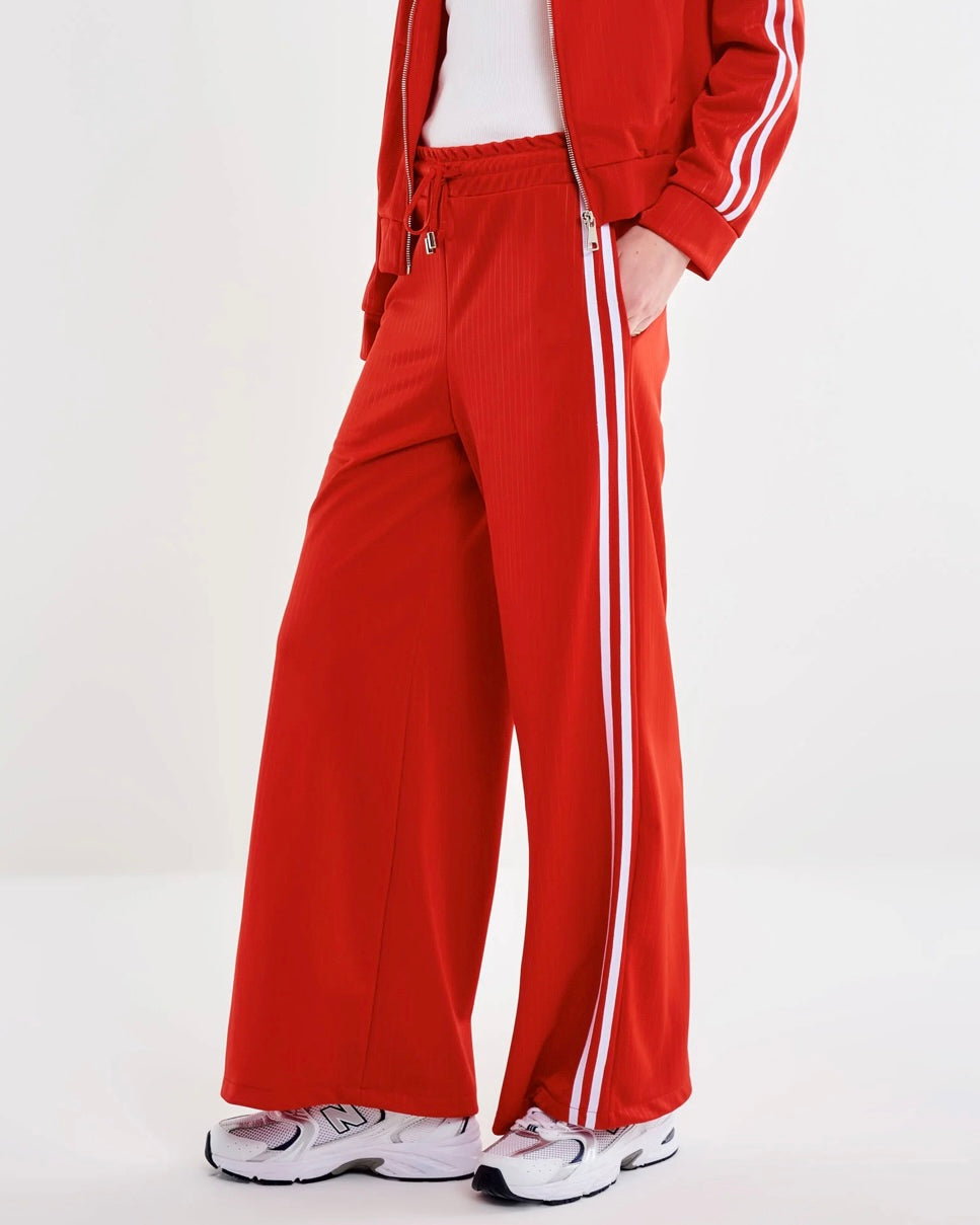 Track pants with galloon stripes in red