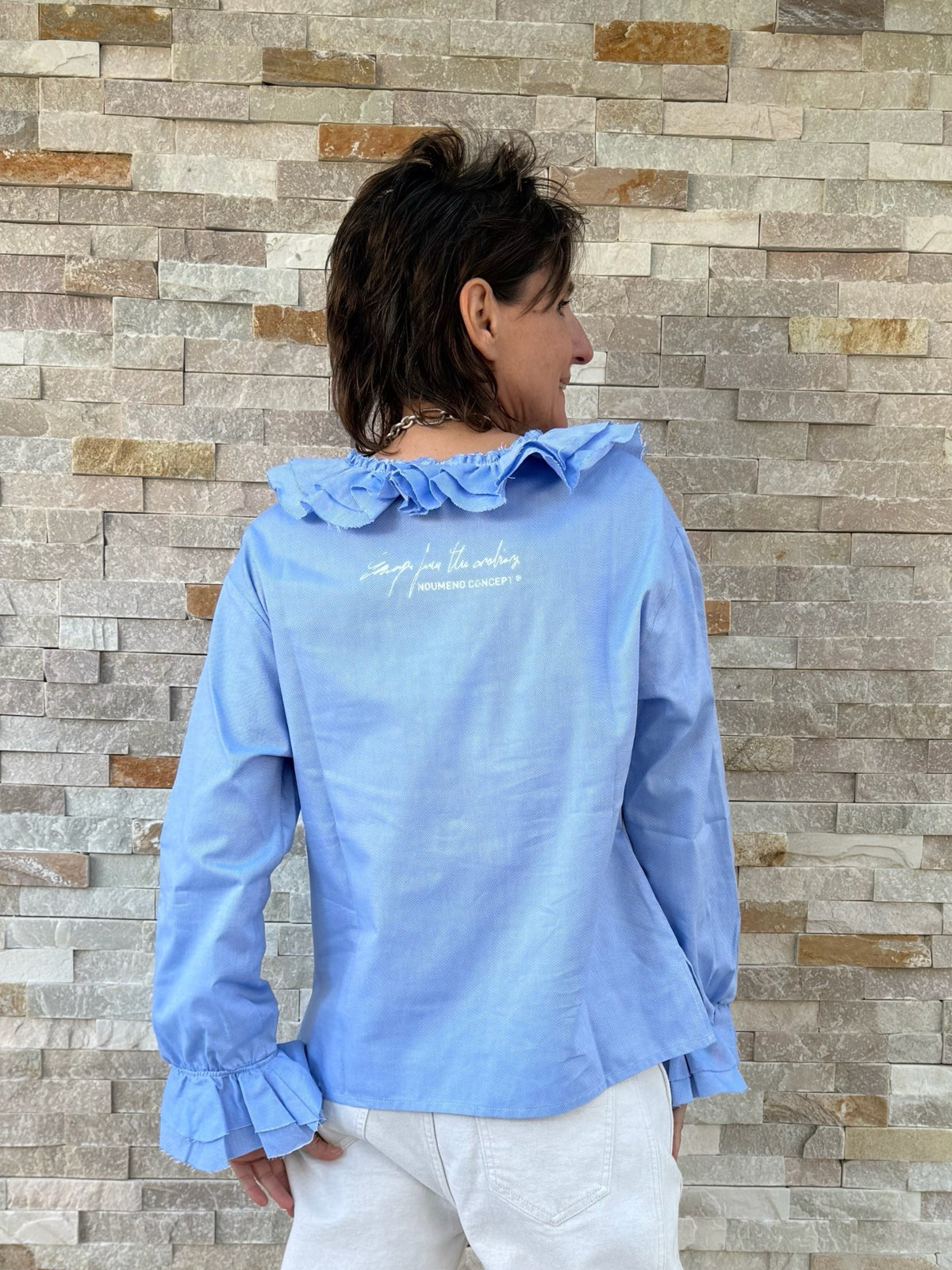 Volant Bluse mit offenen Kanten in Hellblau