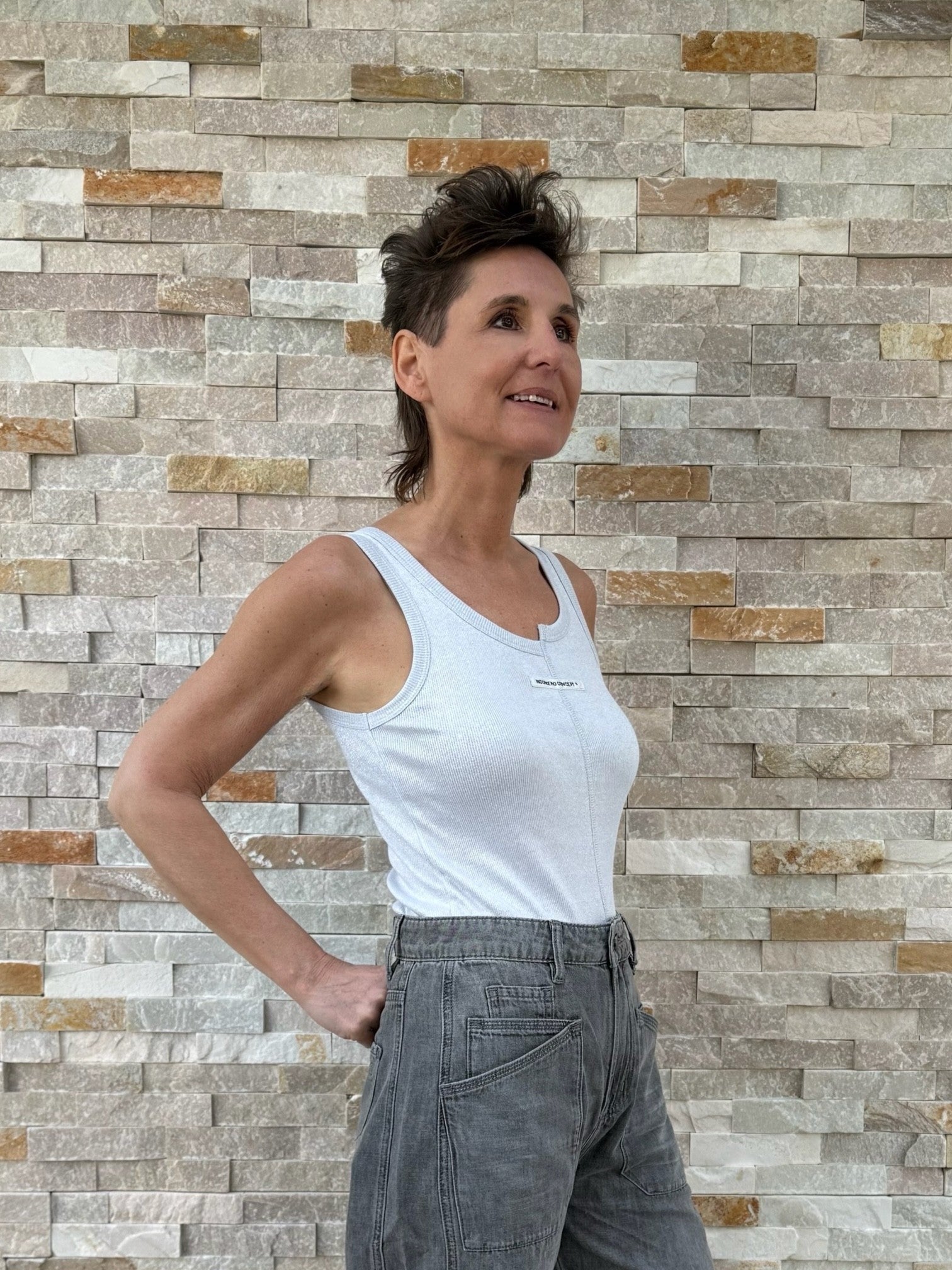 Lurex Top mit asymetrischen Ausschnitt in Silber