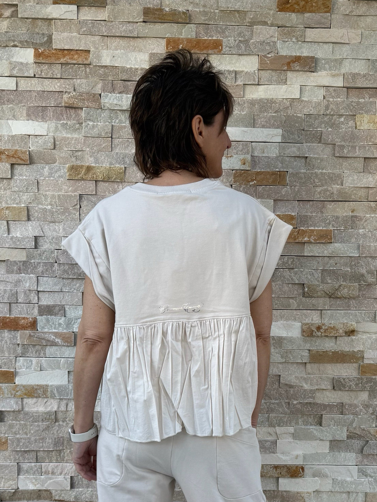 Sleeveless sweatshirt with blouse insert on the back in Calce
