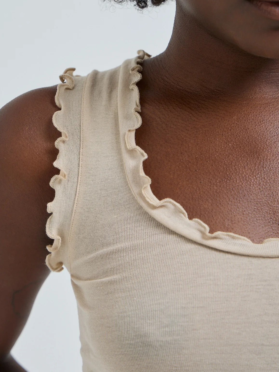 Flounce top with ruffles in black