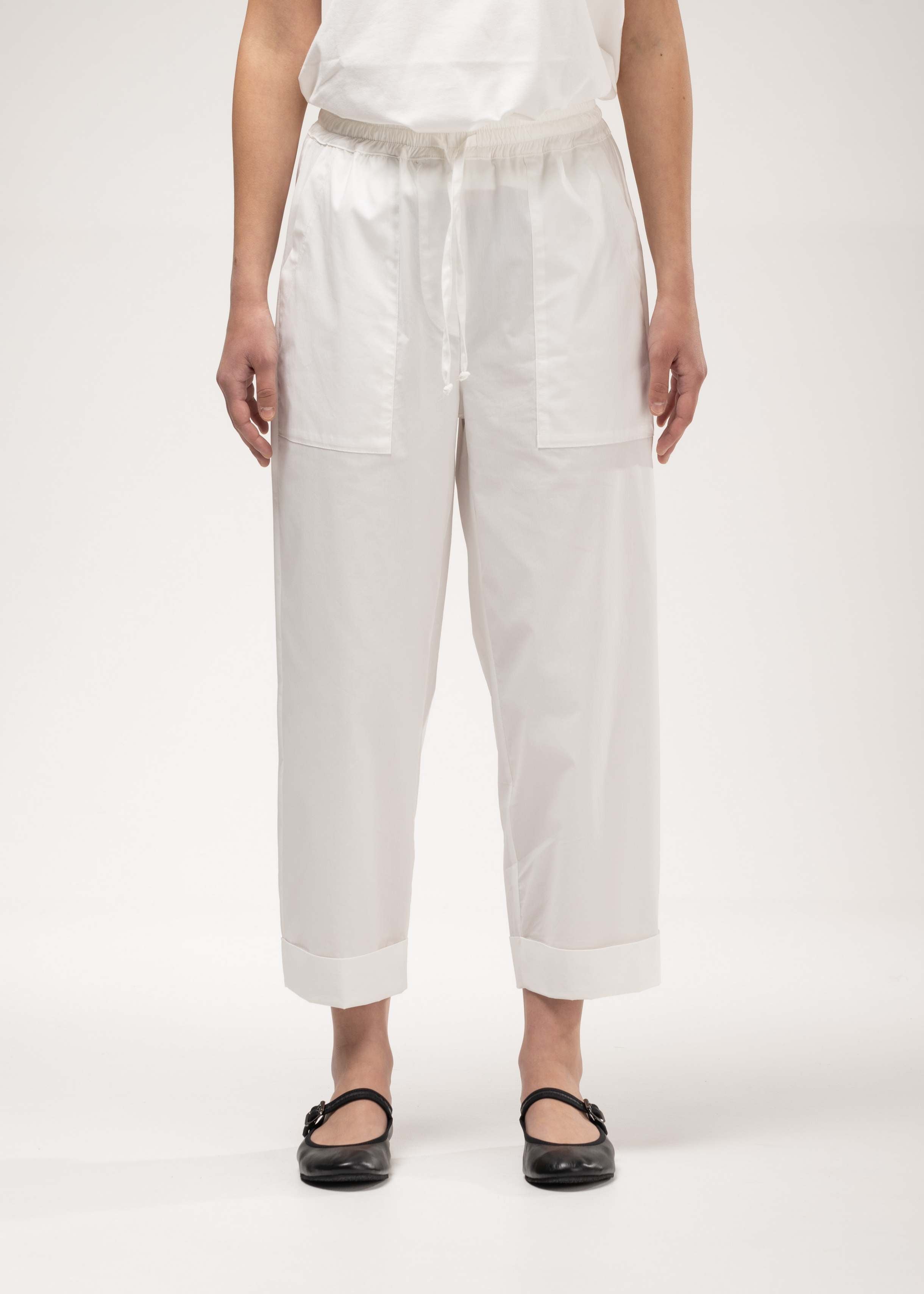 Lightweight off-white trousers with patch pockets