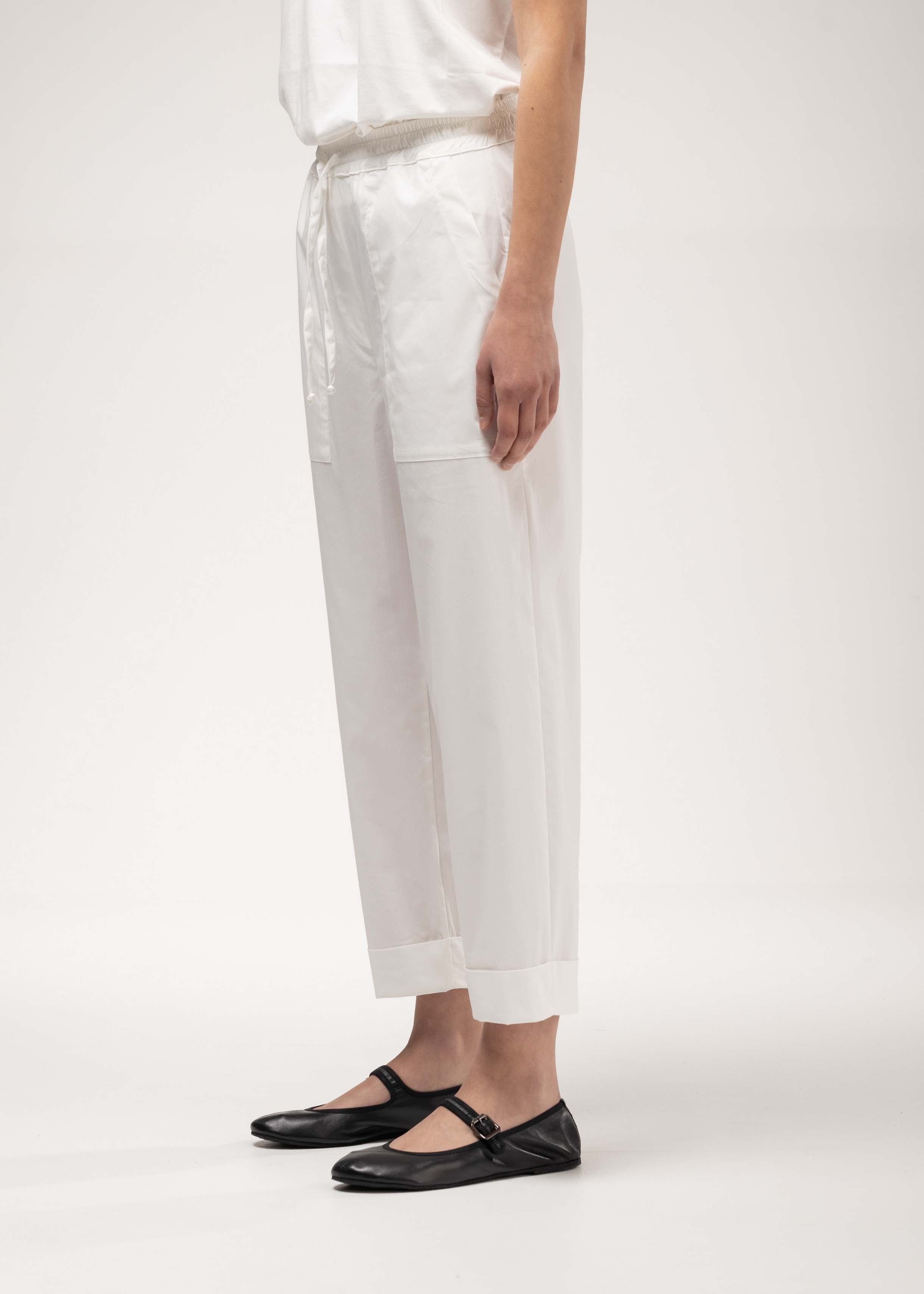 Lightweight off-white trousers with patch pockets