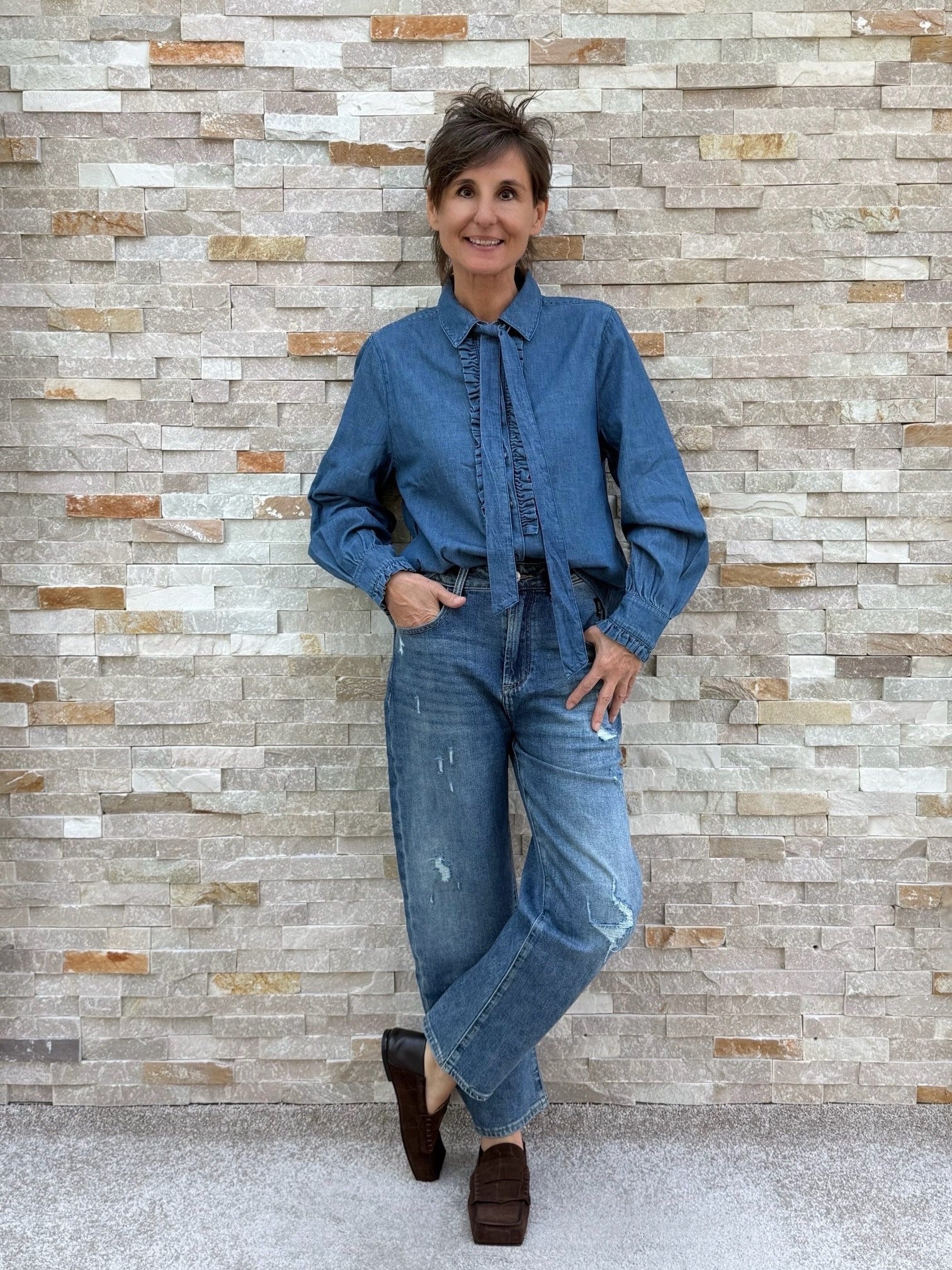 Jean Blouse with Ruffle Details and Bow in Mid-Blue