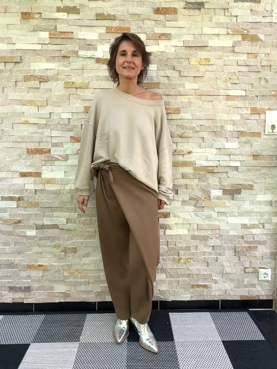 Video laden: Jersey Hose mit Wickelbund Cognac